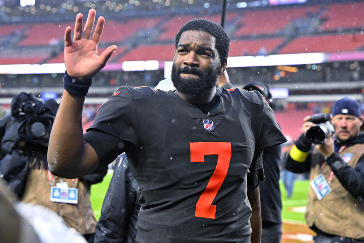 Jacoby Brissett waves to the crowd as he leaves the field after a victory over the Bucs